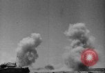 Image of British soldiers retrieve a disabled tank while being shelled North Africa, 1941, second 54 stock footage video 65675050209