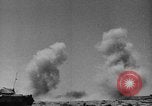 Image of British soldiers retrieve a disabled tank while being shelled North Africa, 1941, second 55 stock footage video 65675050209