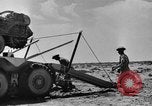 Image of British soldiers retrieve a disabled tank while being shelled North Africa, 1941, second 62 stock footage video 65675050209