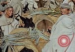 Image of snake charmer Marrakesh Morocco, 1942, second 4 stock footage video 65675050221