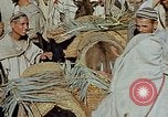 Image of snake charmer Marrakesh Morocco, 1942, second 5 stock footage video 65675050221