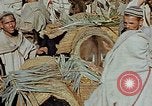 Image of snake charmer Marrakesh Morocco, 1942, second 6 stock footage video 65675050221