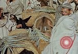 Image of snake charmer Marrakesh Morocco, 1942, second 7 stock footage video 65675050221