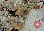 Image of snake charmer Marrakesh Morocco, 1942, second 8 stock footage video 65675050221