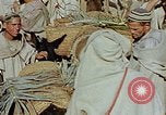 Image of snake charmer Marrakesh Morocco, 1942, second 9 stock footage video 65675050221