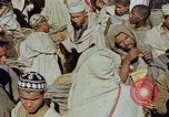 Image of snake charmer Marrakesh Morocco, 1942, second 10 stock footage video 65675050221