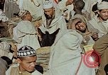 Image of snake charmer Marrakesh Morocco, 1942, second 12 stock footage video 65675050221
