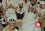 Image of snake charmer Marrakesh Morocco, 1942, second 13 stock footage video 65675050221