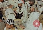 Image of snake charmer Marrakesh Morocco, 1942, second 14 stock footage video 65675050221