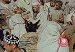 Image of snake charmer Marrakesh Morocco, 1942, second 15 stock footage video 65675050221