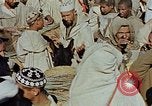 Image of snake charmer Marrakesh Morocco, 1942, second 16 stock footage video 65675050221