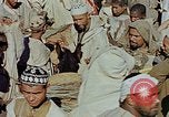 Image of snake charmer Marrakesh Morocco, 1942, second 17 stock footage video 65675050221