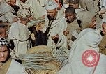 Image of snake charmer Marrakesh Morocco, 1942, second 18 stock footage video 65675050221