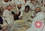 Image of snake charmer Marrakesh Morocco, 1942, second 21 stock footage video 65675050221