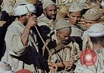 Image of snake charmer Marrakesh Morocco, 1942, second 23 stock footage video 65675050221