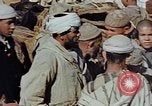 Image of snake charmer Marrakesh Morocco, 1942, second 24 stock footage video 65675050221