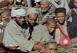 Image of snake charmer Marrakesh Morocco, 1942, second 27 stock footage video 65675050221