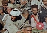 Image of snake charmer Marrakesh Morocco, 1942, second 28 stock footage video 65675050221