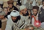 Image of snake charmer Marrakesh Morocco, 1942, second 30 stock footage video 65675050221