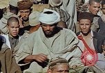 Image of snake charmer Marrakesh Morocco, 1942, second 31 stock footage video 65675050221
