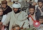 Image of snake charmer Marrakesh Morocco, 1942, second 32 stock footage video 65675050221