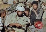 Image of snake charmer Marrakesh Morocco, 1942, second 33 stock footage video 65675050221