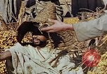 Image of snake charmer Marrakesh Morocco, 1942, second 48 stock footage video 65675050221