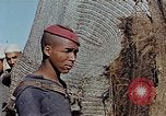 Image of snake charmer Marrakesh Morocco, 1942, second 52 stock footage video 65675050221