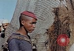 Image of snake charmer Marrakesh Morocco, 1942, second 53 stock footage video 65675050221