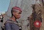 Image of snake charmer Marrakesh Morocco, 1942, second 55 stock footage video 65675050221