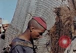 Image of snake charmer Marrakesh Morocco, 1942, second 57 stock footage video 65675050221