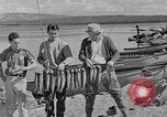 Image of tourists and wildlife Wyoming United States USA, 1936, second 12 stock footage video 65675050294