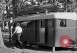 Image of tourists and wildlife Wyoming United States USA, 1936, second 37 stock footage video 65675050294
