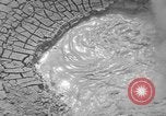 Image of mud volcano Wyoming United States USA, 1936, second 6 stock footage video 65675050295