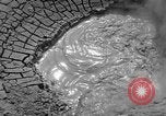 Image of mud volcano Wyoming United States USA, 1936, second 8 stock footage video 65675050295