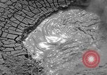 Image of mud volcano Wyoming United States USA, 1936, second 9 stock footage video 65675050295