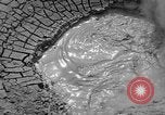 Image of mud volcano Wyoming United States USA, 1936, second 10 stock footage video 65675050295