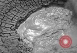 Image of mud volcano Wyoming United States USA, 1936, second 11 stock footage video 65675050295