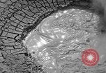 Image of mud volcano Wyoming United States USA, 1936, second 12 stock footage video 65675050295
