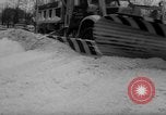 Image of bulldozer clears snow Mayville Wisconsin USA, 1966, second 51 stock footage video 65675050304