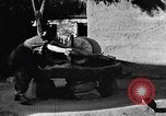Standbild Dorf Schleifstein China, 1938, aus Sekunde 20 historischem Filmmaterial Videoclip 65675050387