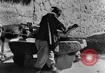 Standbild Dorf Schleifstein China, 1938, aus Sekunde 28 historischem Filmmaterial Videoclip 65675050387