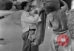 Image of bean cakes China, 1938, second 10 stock footage video 65675050390