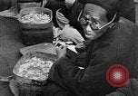 Image of Market day China, 1938, second 61 stock footage video 65675050391
