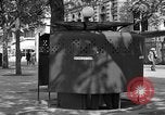 Image of street urinal Paris France, 1956, second 18 stock footage video 65675050418