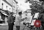 Image of painter Paris France, 1956, second 13 stock footage video 65675050420