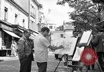 Image of painter Paris France, 1956, second 15 stock footage video 65675050420
