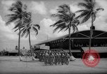 Image of flag raising exercise Guam, 1939, second 1 stock footage video 65675050438