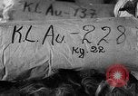 Image of warehouse filled with concentration camp prisoner belongings Poland, 1945, second 26 stock footage video 65675050451