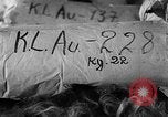 Image of warehouse filled with concentration camp prisoner belongings Poland, 1945, second 27 stock footage video 65675050451